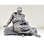 A Bronzed Spelter Figure of a Seated Scholar, 10.5ins high