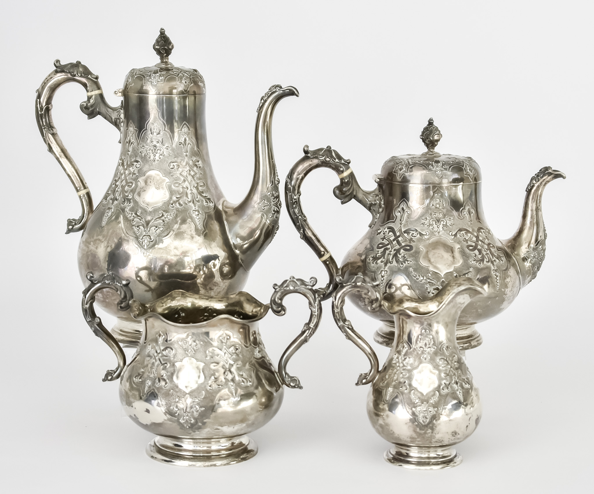 A Victorian Silver Four-Piece Tea and Coffee Service, by Robert Hennell III, London 1860 and
