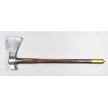 An 18th/19th Century Continental Axe, 7ins x 13ins, hammer back head, wood shaft, brass top and