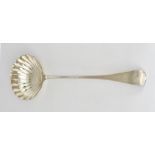 A George III Silver Soup Ladle, by William Eley and William Fearn, London 1817, with shell pattern