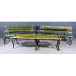 Two Metal and Wood Slatted Garden Benches, with scroll ends and replacement slats, one 62ins wide,