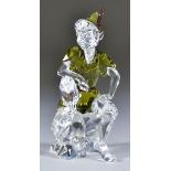 A Swarovski Crystal Model of "Peter Pan", wearing green hat and tunic, boxed and with outer box