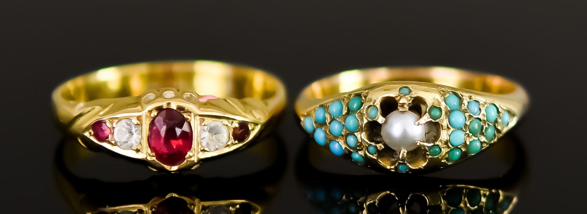 Two Gem Set Rings, 20th Century, comprising - one 18ct gold set with three red stones and two