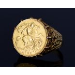 A 9ct Gold Ring, set with a half sovereign 1908, size R, gross weight 8.2g