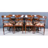 A Set of Eight Mahogany Dining Chairs of Late George III Design, including two armchairs with scroll