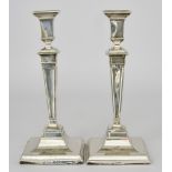 A Pair of George V Silver Pillar Candlesticks by Martin Hall & Co Sheffield 1912, of square form