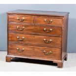 A George III Mahogany Chest, with moulded edge to top, fitted two short and three long graduated