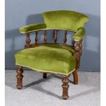A Victorian Tub-Shaped Library Chair, with shaped crest, horseshoe shaped back, baluster turned