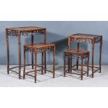 A Nest of Four Chinese Hardwood Rectangular Occasional Tables, with flush panels to top, fretted
