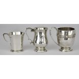 A George V Silver Baluster-Shaped Christening Mug and Two Others, the George V mug by Barker Bros,