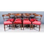 A Set of Eight William IV Mahogany Dining Chairs with deep curved crest rails, moulded splats and