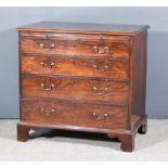 A Late George III Mahogany Chest, with moulded edge to top, fitted brushing slide and four long