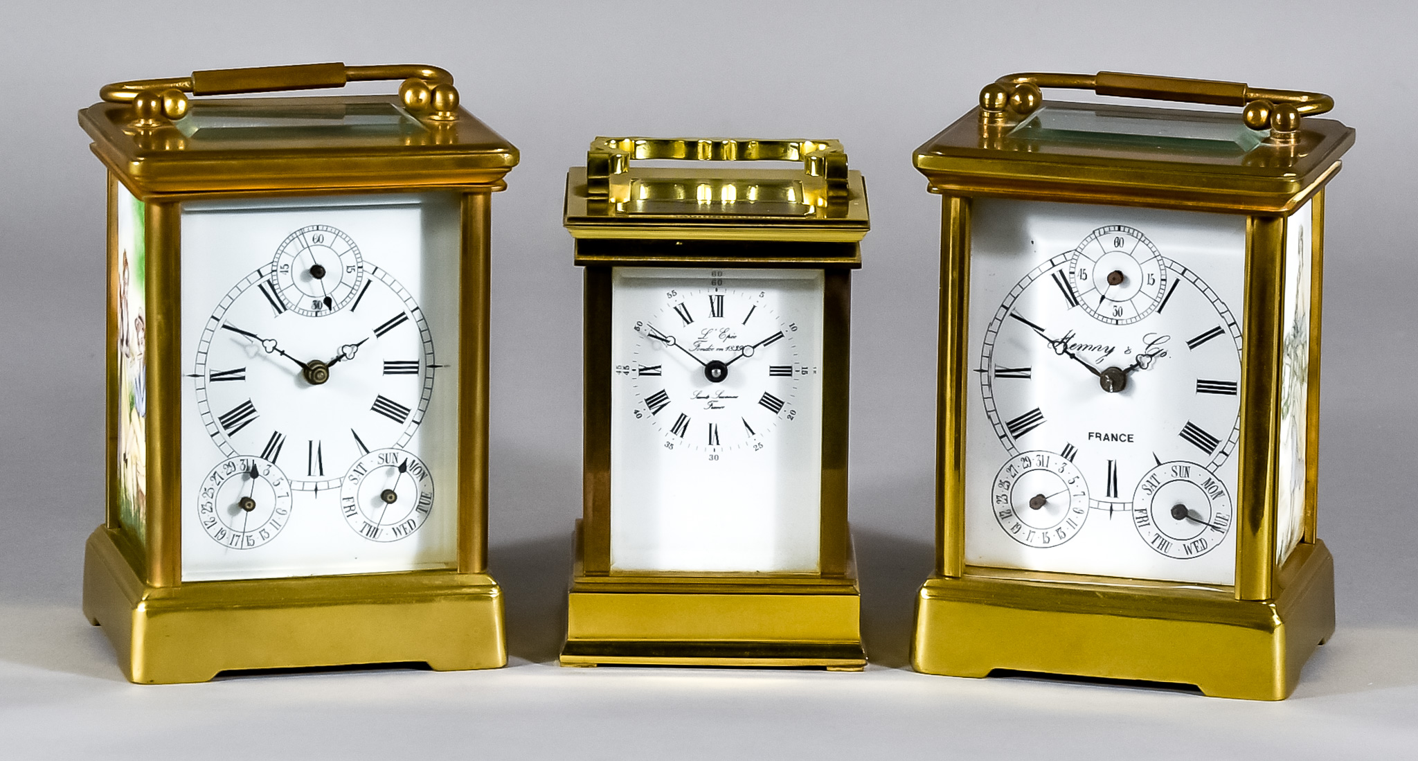 Two 20th Century Brass and Porcelain Cased Carriage Timepieces and One Other, the two timepieces