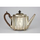 A George III Silver Oval Teapot, possibly by Thomas Oliphant, London 1789, of shaped outline,