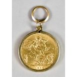 A George V Sovereign, 1915, set in plain 9ct gold mount, gross weight 9.6g