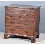 A Mahogany Chest of "Georgian" Design, moulded edge to top, fitted brushing slide, two short and