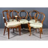 A Mahogany Armchair and a Set of Four Victorian Walnut Balloon Back Dining Chairs, the armchair with