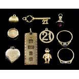 A Mixed Lot of 9ct Gold, comprising - one ingot pendant, 45mm x 15mm, one heart shaped locket,