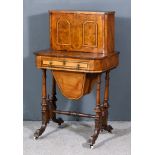 A Victorian Figured Walnut Worktable inlaid with bandings and stringings, the upper part with