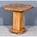 A 1930s Figured Walnut Octagonal Occasional Table of "Art Deco" Design, the top quarter veneered and