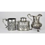 A Victorian Silver Christening Mug, a Milk Jug and and Early 20th Century Tea Caddy, the christening