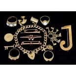 A Mixed Lot of 9ct Gold, comprising - charm bracelet with seven charms, various, brooch depicting