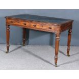 An Early Victorian Mahogany Writing Desk, in the "Gillows" Manner, with blue and gilt leather