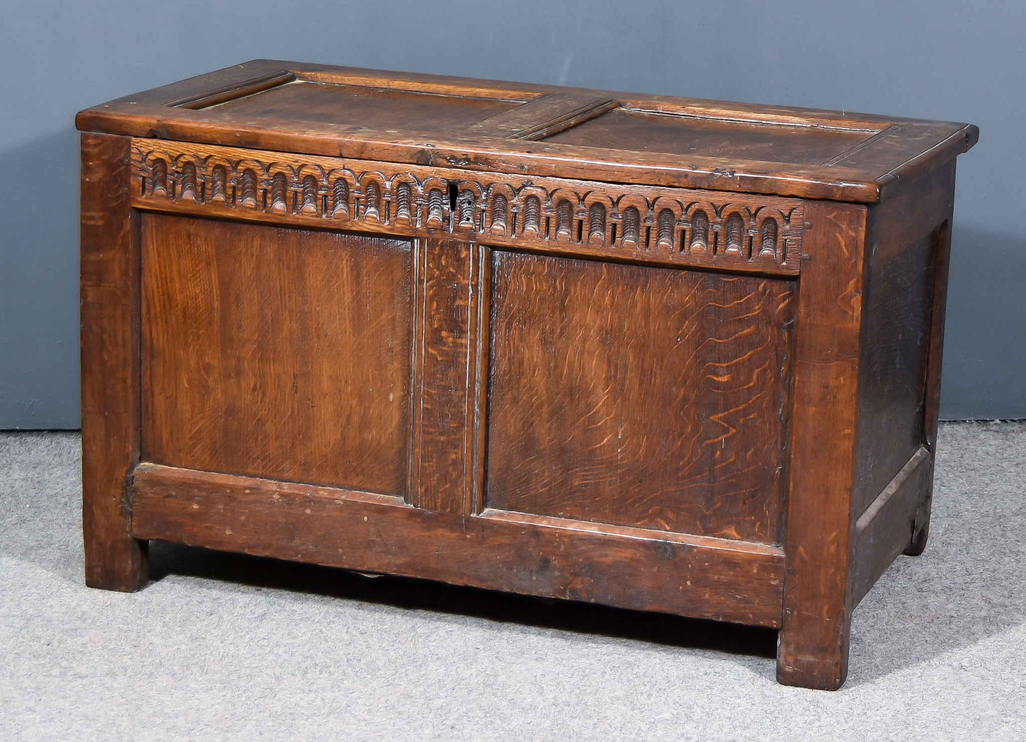 A Late 17th/Early 18th Century Panelled Oak Coffer with two fielded panels to lid and front and with