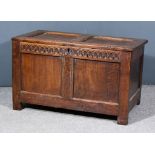 A Late 17th/Early 18th Century Panelled Oak Coffer with two fielded panels to lid and front and with
