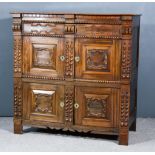 A Late 17th/Early 18th Century and Later Panelled Oak Chest, in two sections, the plain three