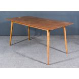 A 1960s Teak Rectangular Kitchen Table, on turned splayed legs, 60ins wide x 30ins deep x 28ins
