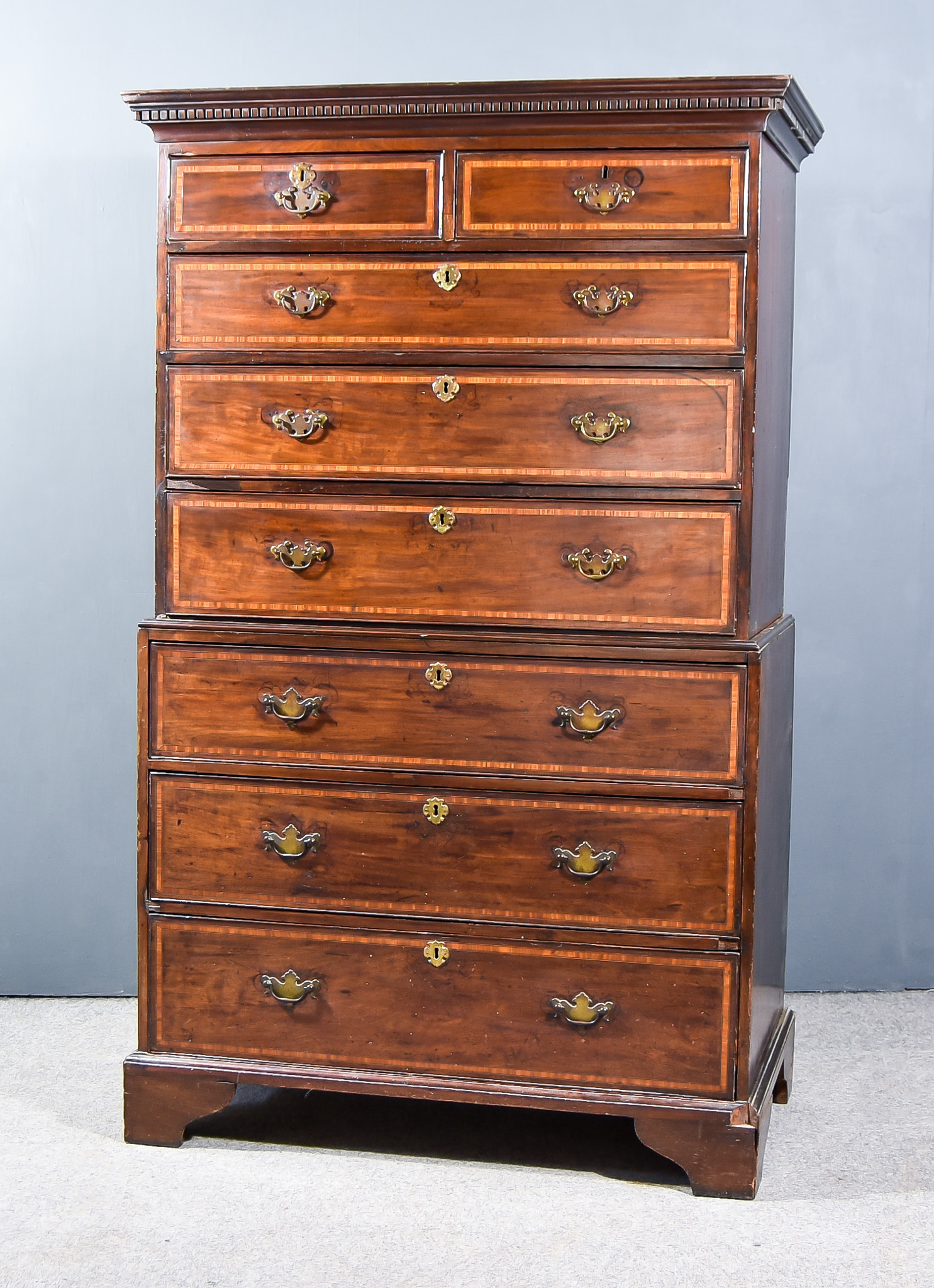 A 19th Century Mahogany Tallboy, the upper part with dentil moulded cornice, fitted two short and