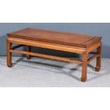 A Chinese Hardwood Rectangular Low Table, Early 20th Century, with flush panel to top, moulded