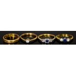 Four 18ct Gold Rings, comprising - one set with small solitaire diamond, approximately .15ct, size