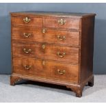 A Georgian Oak Chest of Drawers, with moulded edge to top, fitted two short and three long