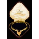 A 9ct Gold Three Bar Bracelet, with heart clasp, 190mm, gross weight 20.8g, in fitted box