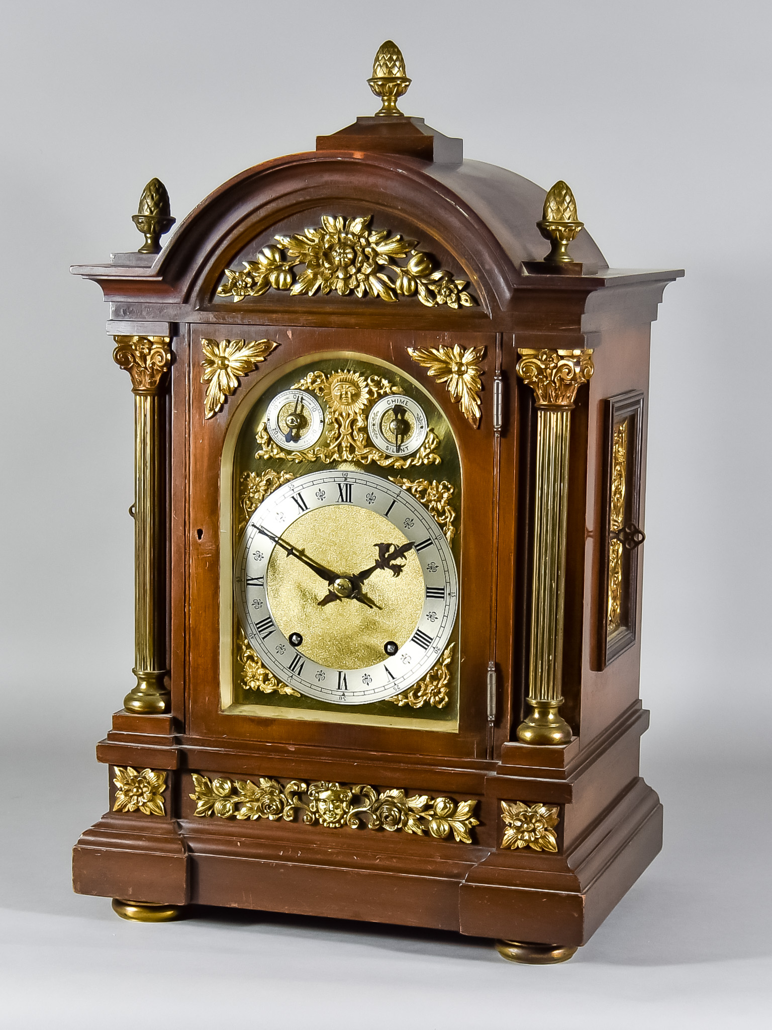A Late 19th/Early 20th Century Mahogany Cased Mantel Clock by Winterhalder & Hofmeier, the arched