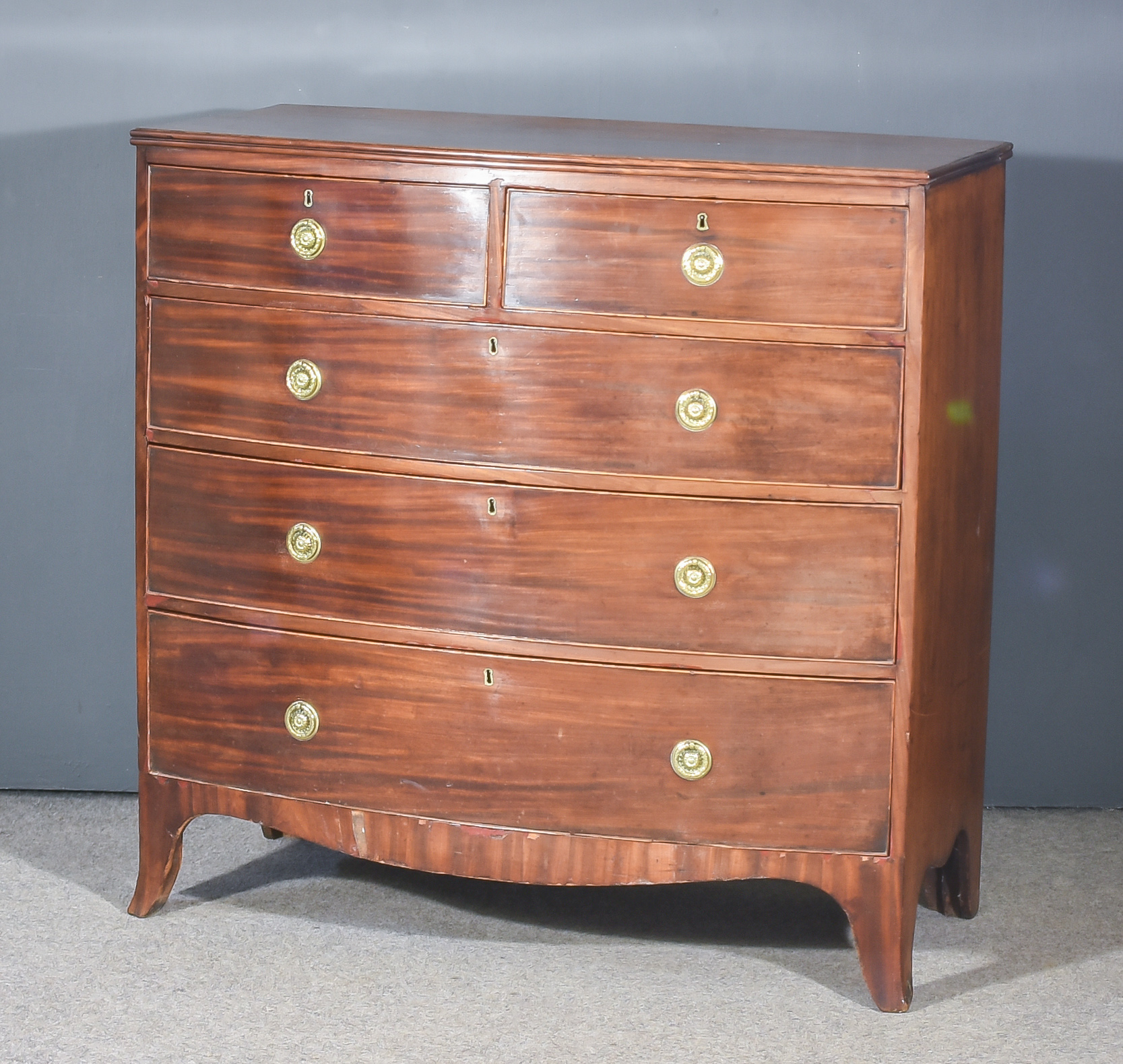 A George III Mahogany Bow Fronted Chest, with reeded edge to top, fitted two short and three long