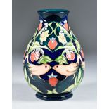 A Moorcroft Pottery Vase, shape No.7/7, tube-lined and decorated in colours with "Strawberry