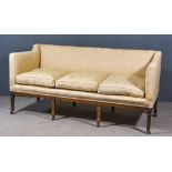 A Regency Mahogany Square Back Three Seat Settee, upholstered in pale pink cloth, fluted seat