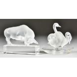 A Lalique Clear and Frosted Bull Paperweight, 3.5ins high, and a Lalique ashtray modelled with two