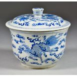A Chinese Porcelain Blue and White Bowl and Cover, painted with shishi amongst clouds, blue four