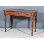 A Victorian Mahogany Side Table, with moulded edge to top, fitted three frieze drawers, on turned