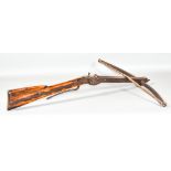 An 18th Century Continental Sporting Cross Bow, 27ins steel limbs, oak stock with iron inlay,