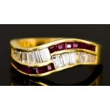 An 18ct Gold Ruby and Diamond Ring, Modern, set with baguette cut diamonds, approximately 1ct, and