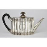 A George III Silver Oval Teapot, by Henry Chawner, London 1788, of reeded form, engraved with