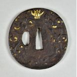 A Japanese Iron Tsuba, Mokko-gata depicting dragons chasing the sacred pearl, 3ins diameter, and one