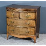 A Mahogany Bow Front Chest of George III Design, with reeded edge to top, fitted brushing slide, two