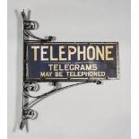A "Telephone, Telegrams May Be Telephoned" Double-Sided Enamel Sign, Early 20th Century, 9ins x