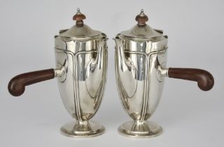 A Pair of George V Silver One-Handled Chocolate Pots by Brook & Son Sheffield 1918, the slightly